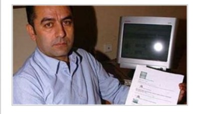 Facebook'ta haber paylaşan memura ceza