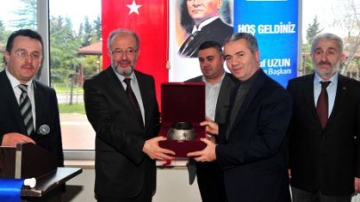 UZUN, DİN GÖREVLİLERİYLE BİR ARADA