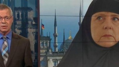 Devlet televizyonunda Merkele kara çarşaf giydirdiler