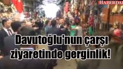 Davutoğlunun çarşı ziyaretinde gerginlik!