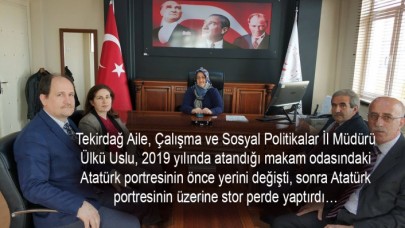 Atatürk portesinin üzerindeki perde koymuş...