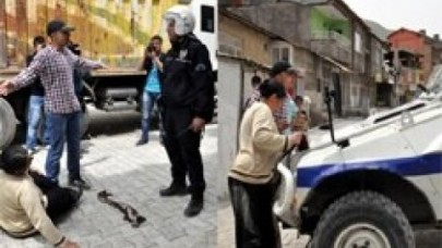 Oğlunu kurtarmak için çırpındı